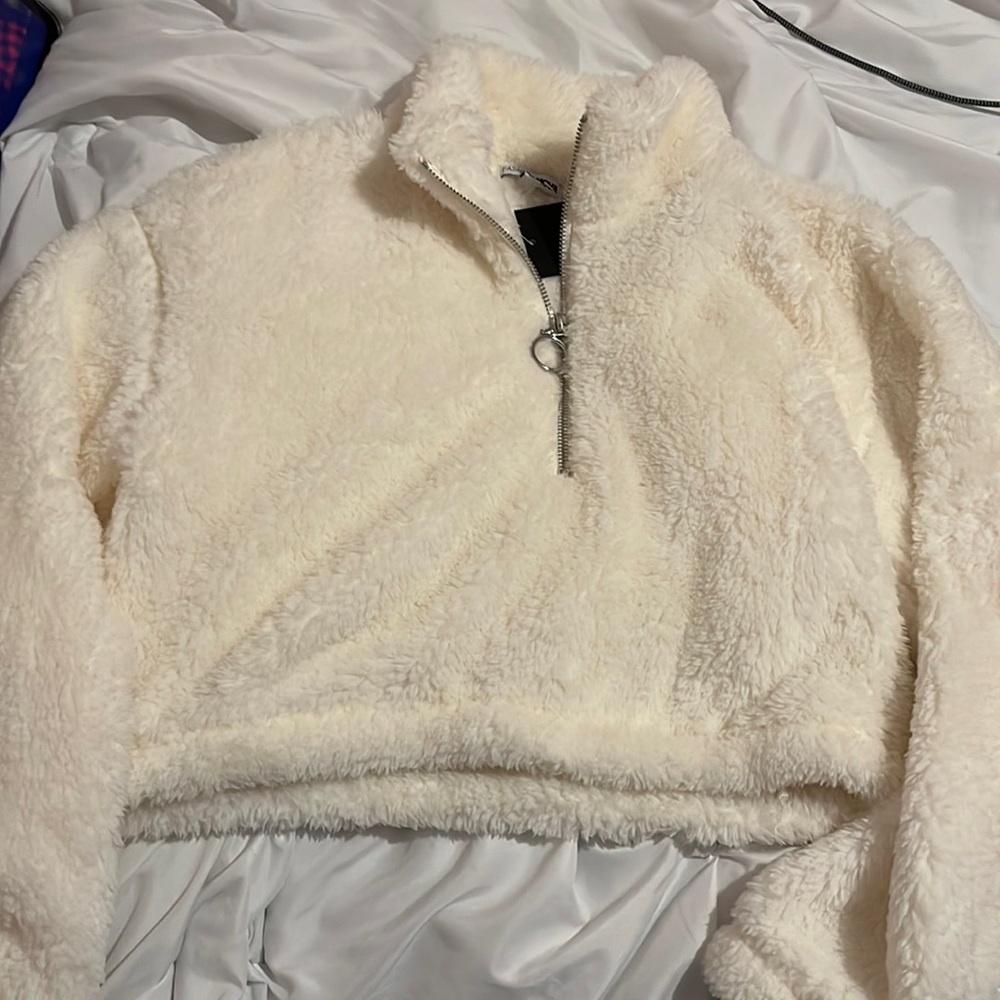 Fuzzy quarter zipped sweater